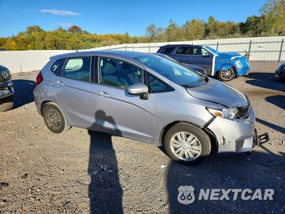 Czwarte zdjęcie samochodu z boku: 2017 HONDA FIT LX VIN:3HGGK5H57HM713171 - miniatura
