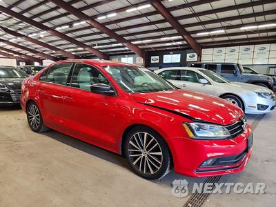 Czwarte zdjęcie samochodu z boku: 2016 VOLKSWAGEN JETTA SPORT VIN:3VWB17AJ4GM269239 - miniatura