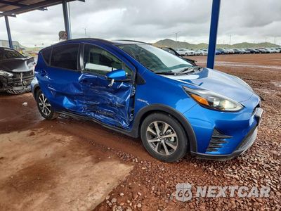 Czwarte zdjęcie samochodu z boku: 2018 TOYOTA PRIUS C ONE VIN:JTDKDTB39J1604440 - miniatura
