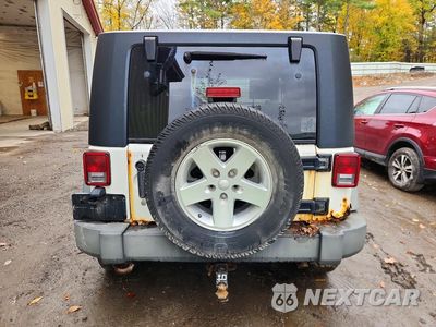 Zdjęcie 6 z 13 samochodu: 2010 JEEP WRANGLER SPORT VIN:1J4AA2D15AL116661 - miniatura