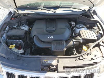 Zdjęcie 12 z 13 samochodu: 2014 JEEP GRAND CHEROKEE LIMITED VIN:1C4RJFBG9EC375831 - miniatura