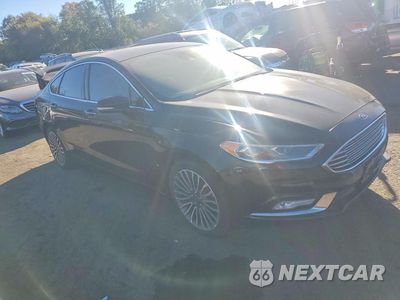 Czwarte zdjęcie samochodu z boku: 2017 FORD FUSION TITANIUM VIN:3FA6P0K90HR414575 - miniatura
