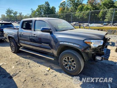 Czwarte zdjęcie samochodu z boku: 2023 TOYOTA TACOMA SR5 V6 VIN:3TMCZ5AN1PM598052 - miniatura