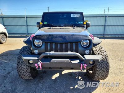 Piąte zdjęcie samochodu w środku: 2017 JEEP WRANGLER UNLIMITED SPORT VIN:1C4BJWDG3HL576174 - miniatura