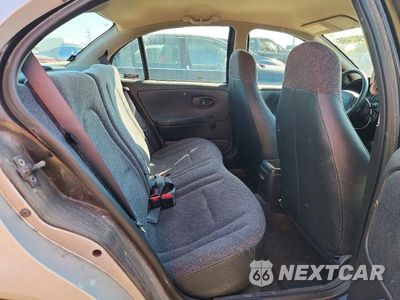 Zdjęcie 10 z 12 samochodu: 2000 SATURN SL1 VIN:1G8ZH5283YZ251340 - miniatura