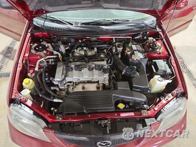 Zdjęcie 11 z 12 samochodu: 2003 MAZDA PROTEGE DX VIN:JM1BJ225330156922 - miniatura