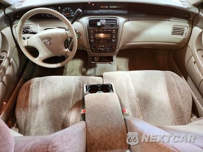 Zdjęcie 8 z 12 samochodu: 2003 TOYOTA AVALON XL VIN:4T1BF28B23U293840 - miniatura