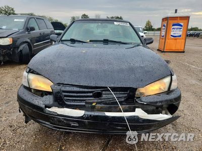 Piąte zdjęcie samochodu w środku: 1999 TOYOTA CAMRY LE VIN:4T1BG22KXXU596747 - miniatura