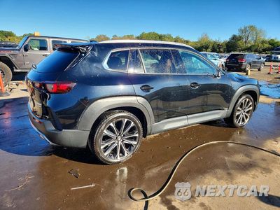 Trzecie zdjęcie samochodu z tyłu: 2024 MAZDA CX-50 PREMIUM VIN:7MMVABDY3RN188558 - miniatura
