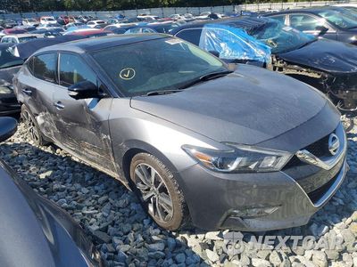 Czwarte zdjęcie samochodu z boku: 2017 NISSAN MAXIMA PLATINUM VIN:1N4AA6AP9HC360674 - miniatura
