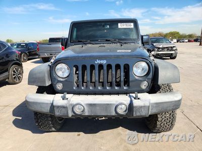 Piąte zdjęcie samochodu w środku: 2017 JEEP WRANGLER UNLIMITED SPORT VIN:1C4BJWDG3HL676419 - miniatura