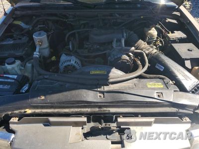 Zdjęcie 12 z 13 samochodu: 2000 CHEVROLET BLAZER VIN:1GNCT18W3YK282287 - miniatura