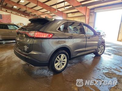 Trzecie zdjęcie samochodu z tyłu: 2016 FORD EDGE SEL VIN:2FMPK4J94GBC51380 - miniatura