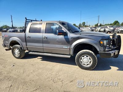 Czwarte zdjęcie samochodu z boku: 2013 FORD F150 SUPERCREW VIN:1FTFW1ET4DKD25536 - miniatura