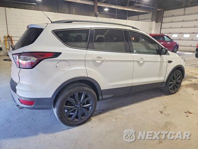 Trzecie zdjęcie samochodu z tyłu: 2017 FORD ESCAPE SE VIN:1FMCU0G94HUE74488 - miniatura