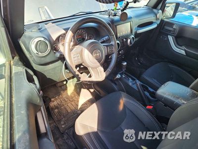 Zdjęcie 8 z 13 samochodu: 2016 JEEP WRANGLER SAHARA VIN:1C4AJWBG0GL167580 - miniatura