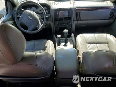 Zdjęcie 8 z 13 samochodu: 2001 JEEP GRAND CHEROKEE LIMITED VIN:1J4GW58N91C733524 - miniatura