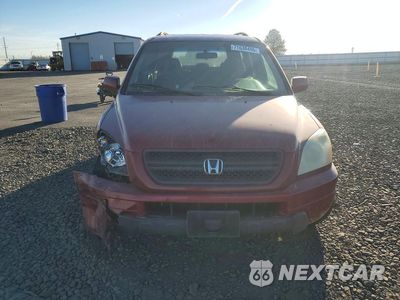 Piąte zdjęcie samochodu w środku: 2004 HONDA PILOT EXL VIN:2HKYF18604H612823 - miniatura
