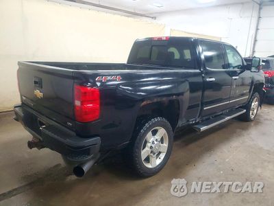 Trzecie zdjęcie samochodu z tyłu: 2016 CHEVROLET SILVERADO K2500 HEAVY DUTY LTZ VIN:1GC1KWE85GF162665 - miniatura