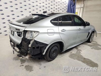 Trzecie zdjęcie samochodu z tyłu: 2019 BMW X6 M VIN:5YMKW8C5XK0Y75030 - miniatura
