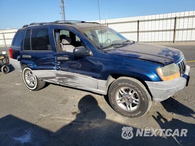 Czwarte zdjęcie samochodu z boku: 2000 JEEP GRAND CHEROKEE LAREDO VIN:1J4G248N9YC187100 - miniatura