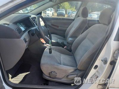 Zdjęcie 7 z 12 samochodu: 2004 TOYOTA COROLLA LE VIN:1NXBR32E14Z280840 - miniatura