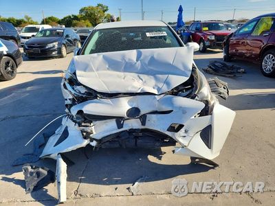 Piąte zdjęcie samochodu w środku: 2016 TOYOTA PRIUS TWO VIN:JTDKBRFU3G3017899 - miniatura