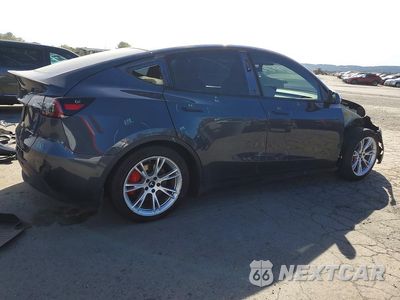 Trzecie zdjęcie samochodu z tyłu: 2022 TESLA MODEL Y VIN:7SAYGDEF3NF393118 - miniatura