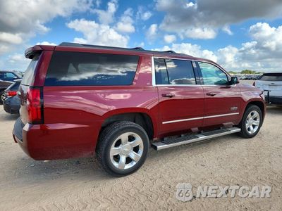 Trzecie zdjęcie samochodu z tyłu: 2017 CHEVROLET SUBURBAN C1500 LT VIN:1GNSCHKC7HR119815 - miniatura