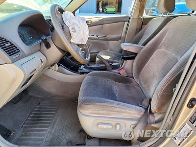 Zdjęcie 7 z 12 samochodu: 2004 TOYOTA CAMRY LE VIN:JTDBE32K240301529 - miniatura