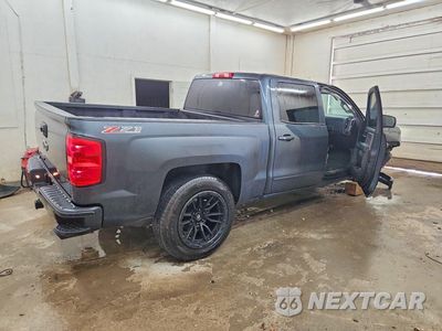 Trzecie zdjęcie samochodu z tyłu: 2017 CHEVROLET SILVERADO K1500 LT VIN:3GCUKREC0HG288354 - miniatura