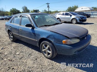 Czwarte zdjęcie samochodu z boku: 1999 CHEVROLET GEO PRIZM BASE VIN:1Y1SK5284XZ449900 - miniatura