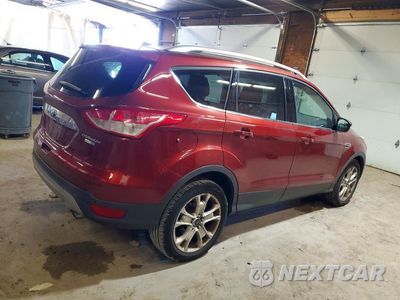 Trzecie zdjęcie samochodu z tyłu: 2016 FORD ESCAPE TITANIUM VIN:1FMCU9JX3GUB87556 - miniatura