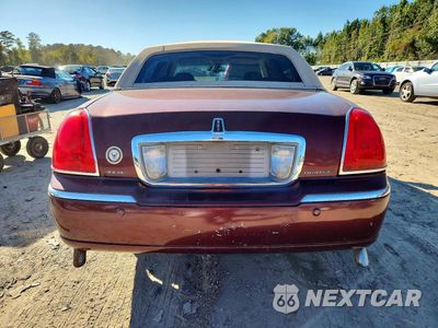 Zdjęcie 6 z 12 samochodu: 2004 LINCOLN TOWN CAR EXECUTIVE VIN:1LNHM81W54Y614022 - miniatura