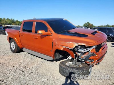 Czwarte zdjęcie samochodu z boku: 2023 RAM 1500 TRX VIN:1C6SRFU99PN695626 - miniatura