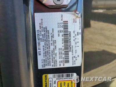 Zdjęcie 12 z 12 samochodu: 2015 FORD FUSION SE HYBRID VIN:3FA6P0LUXFR236061 - miniatura