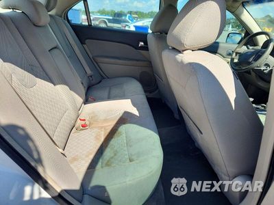Zdjęcie 10 z 12 samochodu: 2011 FORD FUSION SE VIN:3FAHP0HAXBR344603 - miniatura