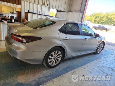 Trzecie zdjęcie samochodu z tyłu: 2022 TOYOTA CAMRY LE VIN:4T1C11AK8NU670505 - miniatura