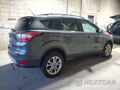 Trzecie zdjęcie samochodu z tyłu: 2017 FORD ESCAPE SE VIN:1FMCU9GD8HUE73434 - miniatura
