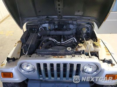 Zdjęcie 11 z 12 samochodu: 2006 JEEP WRANGLER X VIN:1J4FA39S66P742619 - miniatura