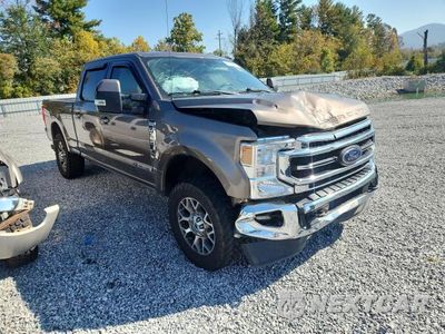 Czwarte zdjęcie samochodu z boku: 2021 FORD F350 SUPER DUTY VIN:1FT8W3BT4MEC80024 - miniatura