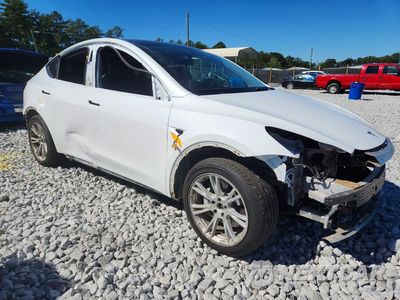 Czwarte zdjęcie samochodu z boku: 2022 TESLA MODEL Y VIN:7SAYGAEE3NF465151 - miniatura