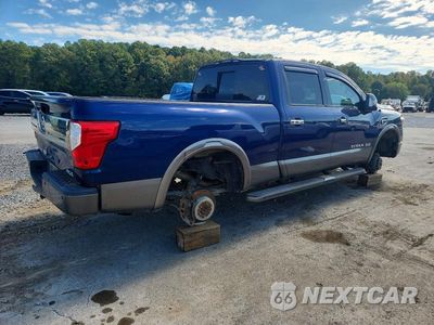 Trzecie zdjęcie samochodu z tyłu: 2017 NISSAN TITAN XD PLATINUM RESERVE VIN:1N6BA1F49HN568619 - miniatura