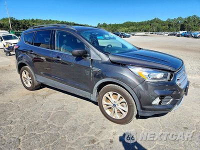 Czwarte zdjęcie samochodu z boku: 2018 FORD ESCAPE SEL VIN:1FMCU9HD1JUA98975 - miniatura