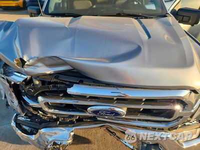 Zdjęcie 11 z 13 samochodu: 2021 FORD F150 XLT VIN:1FTFW1E57MKE54534 - miniatura