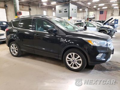 Czwarte zdjęcie samochodu z boku: 2017 FORD ESCAPE SE VIN:1FMCU9G93HUD78355 - miniatura