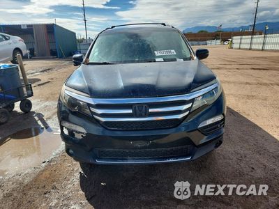 Piąte zdjęcie samochodu w środku: 2016 HONDA PILOT TOURING VIN:5FNYF6H96GB094467 - miniatura