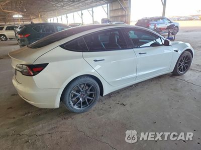 Trzecie zdjęcie samochodu z tyłu: 2021 TESLA MODEL 3 VIN:5YJ3E1EA4MF871853 - miniatura