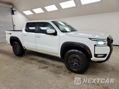 Czwarte zdjęcie samochodu z boku: 2026 NISSAN FRONTIER PRO-4X VIN:1N6ED1EK7TN639703 - miniatura
