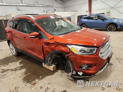 Czwarte zdjęcie samochodu z boku: 2019 FORD ESCAPE TITANIUM VIN:1FMCU9J96KUC42771 - miniatura
